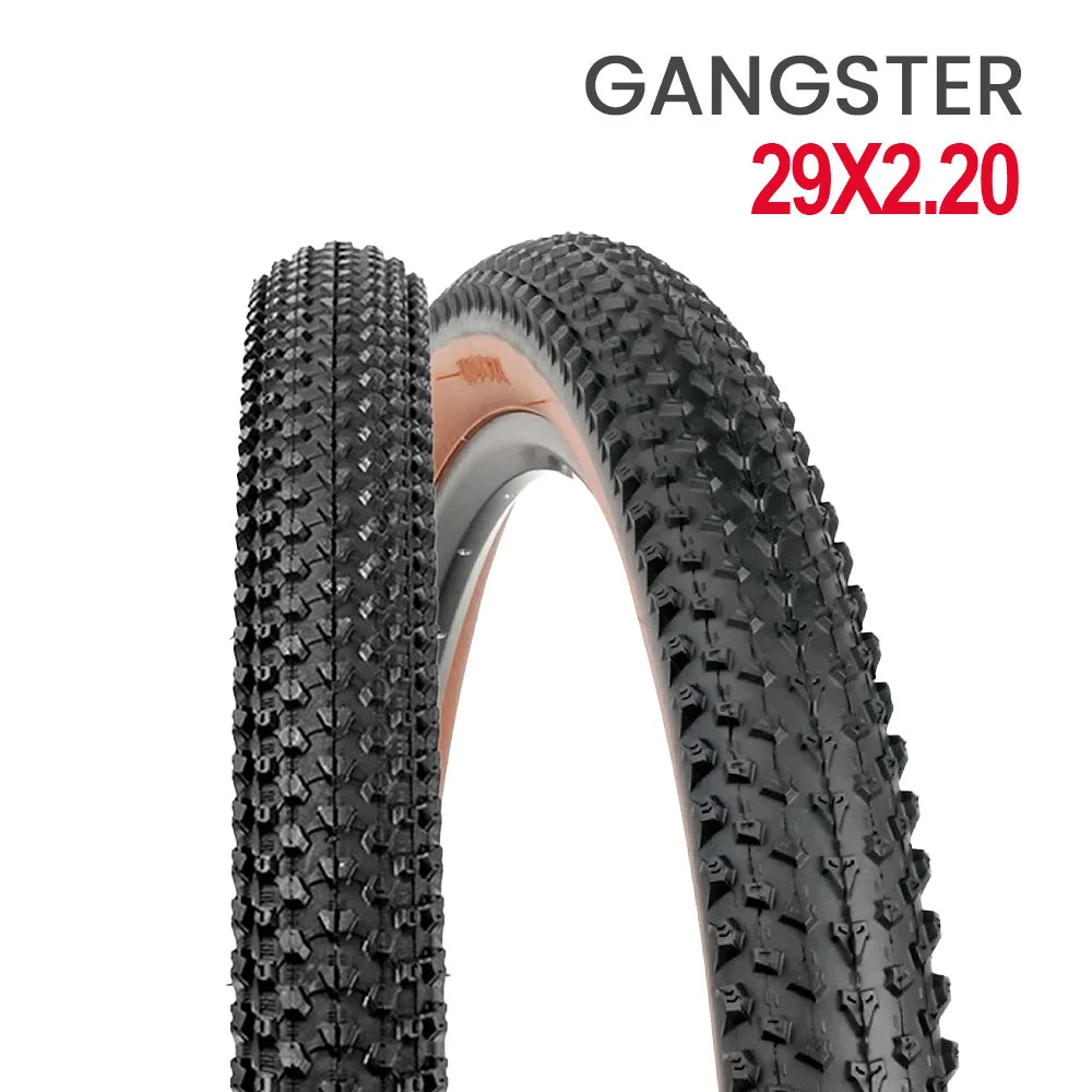 Pneu 29 x 2.20 tubeless 60tpi modelo gangster preto com faixa marrom kevlar
